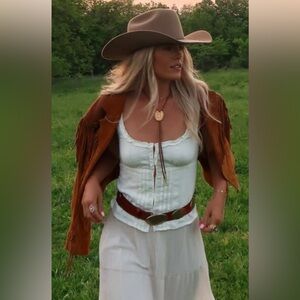 Leather cowgirl jacket.